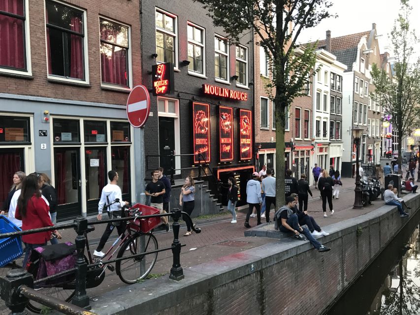 Amsterdam: Red Light District and Local Pub Tour - Oude Kerk to Chinatown-adjacent streets: setting the tone before the spectacle
