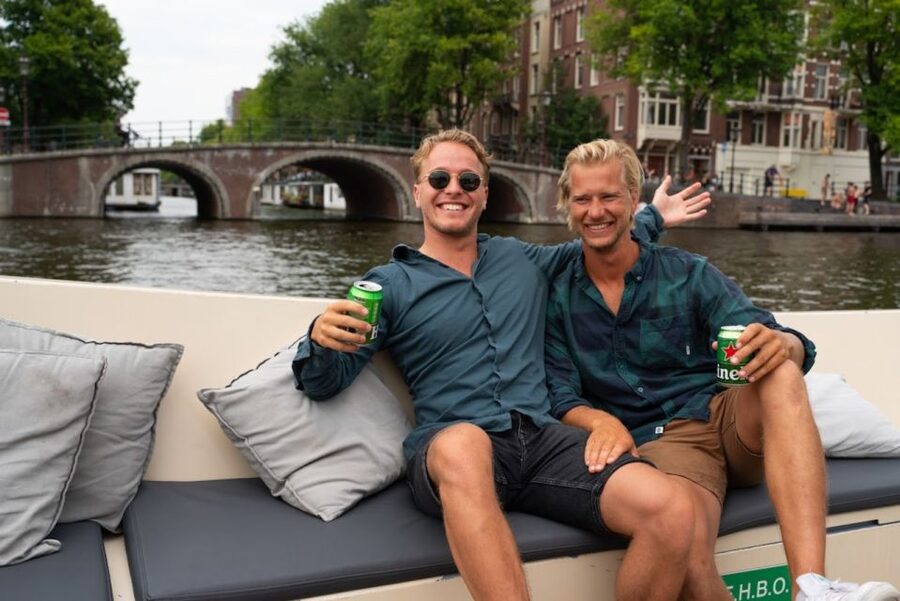 Amsterdam: Red-Light District Pub Crawl and Booze Boat Tour - Amsterdam Red Light Booze Boat + Pub Crawl: The Real Vibe