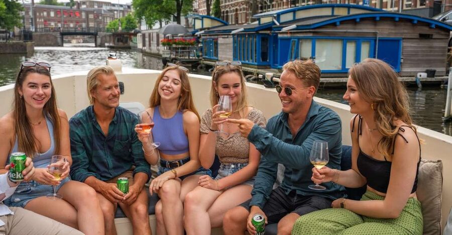 Amsterdam: Red-Light District Pub Crawl and Booze Boat Tour - Starboard Boats: Unlimited Drinks While You See the Canals