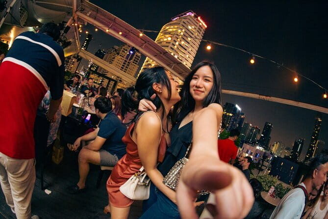 Bangkok After Dark: Pub Crawl Adventure - Stop 3 at Juicy: live music, beer pong energy, and charades