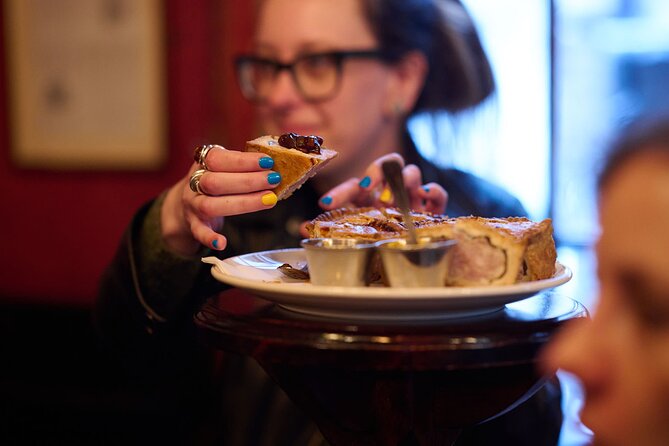 Devour London Historical Pub Tour:Traditional British Food & Ales - Stop 2: The Old Bell Tavern near Covent Garden for sausage roll and cider