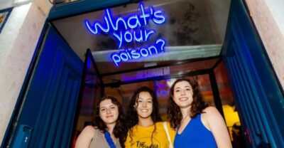 Halloween Haunts: Lisbon Pub Crawl Experience - Meeting at Camões Square with yellow umbrellas and a costume plan