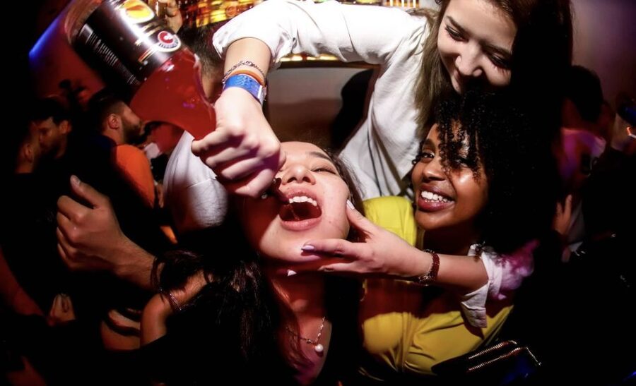Istanbul: Party Pub Crawl with Party Bus - Starting Line Energy: Raki Shots and Drinking Games at the Meeting Bar