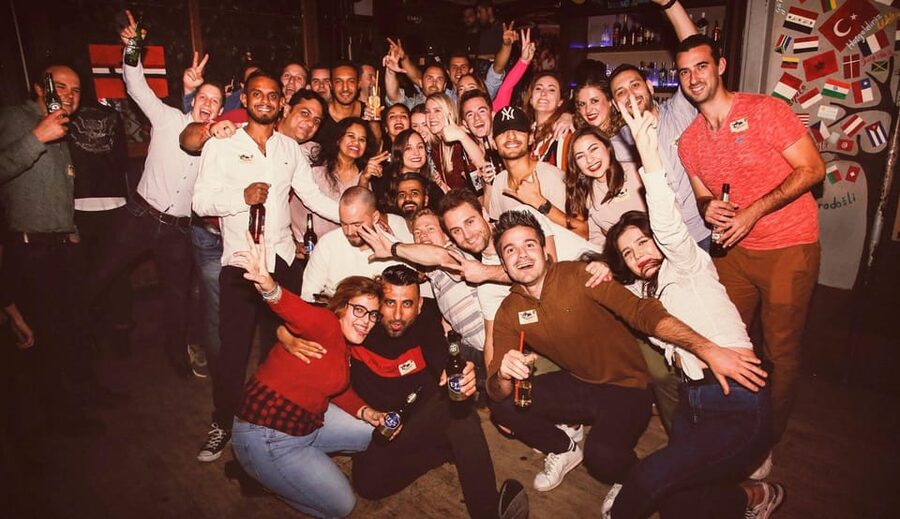 Istanbul: Rooftop Pub Crawl with Party Bus - Icebreakers on the way: games, raki shots, and group momentum