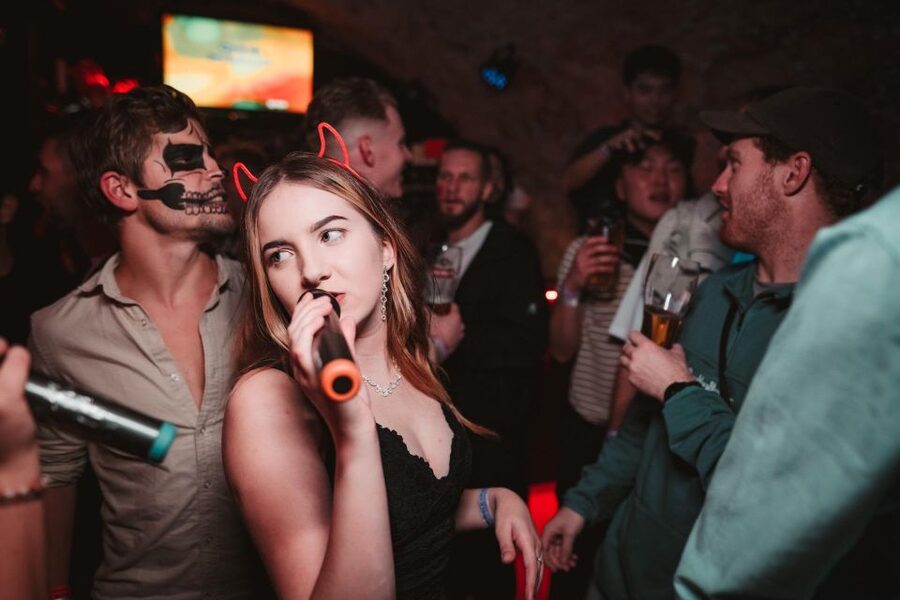 Krakow: Pub Crawl with 1 Hour of Unlimited Alcoholic Drinks - Drinks, games, and group energy: how guides like Fabi and Yeray shape the night
