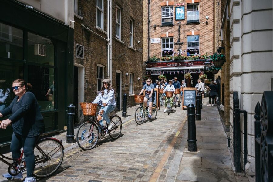 London: Landmarks & Secrets Bike Tour with Pub & Street Art - Trafalgar Square and Covent Garden: where the tour turns playful