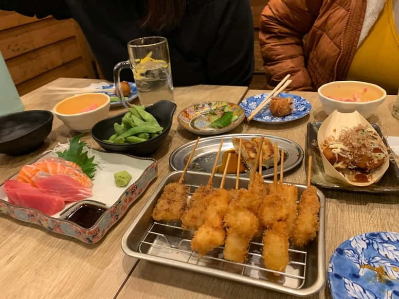Osaka: Namba Pub Bar Crawl with a Local Guide - Stop 3 in American Village: cocktails and whiskey tasting (often with a rooftop vibe)