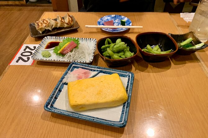 Osaka Nights: Ultimate Pub Bar Crawl with an Expert Local Guide - Rain-ready Osaka: why this tour keeps its promise