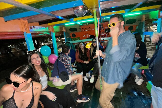 Party Crawl: 6 Nightclubs, DiscoTruck, AfterParty, 1h Openbar pub - La Candelaria rooftop warm-up: where the group energy is born