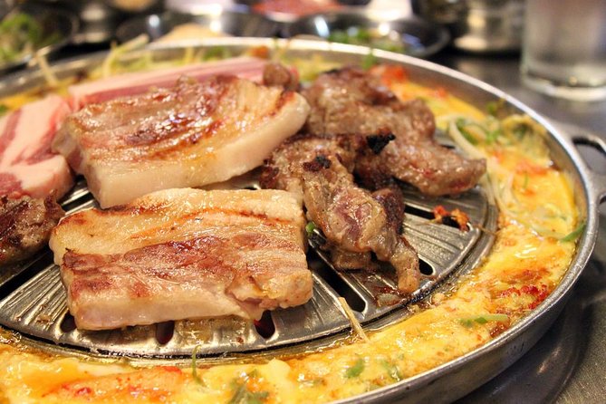 Seoul: Anthony Bourdain-Inspired BBQ and Pub Experience - Mapo District Korean BBQ and pub culture, not a food court loop